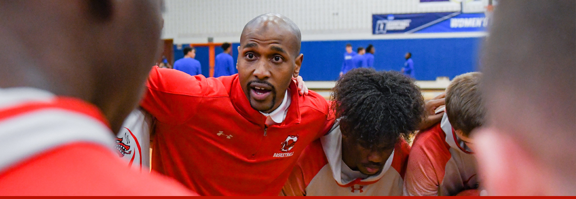 coach mo in huddle
